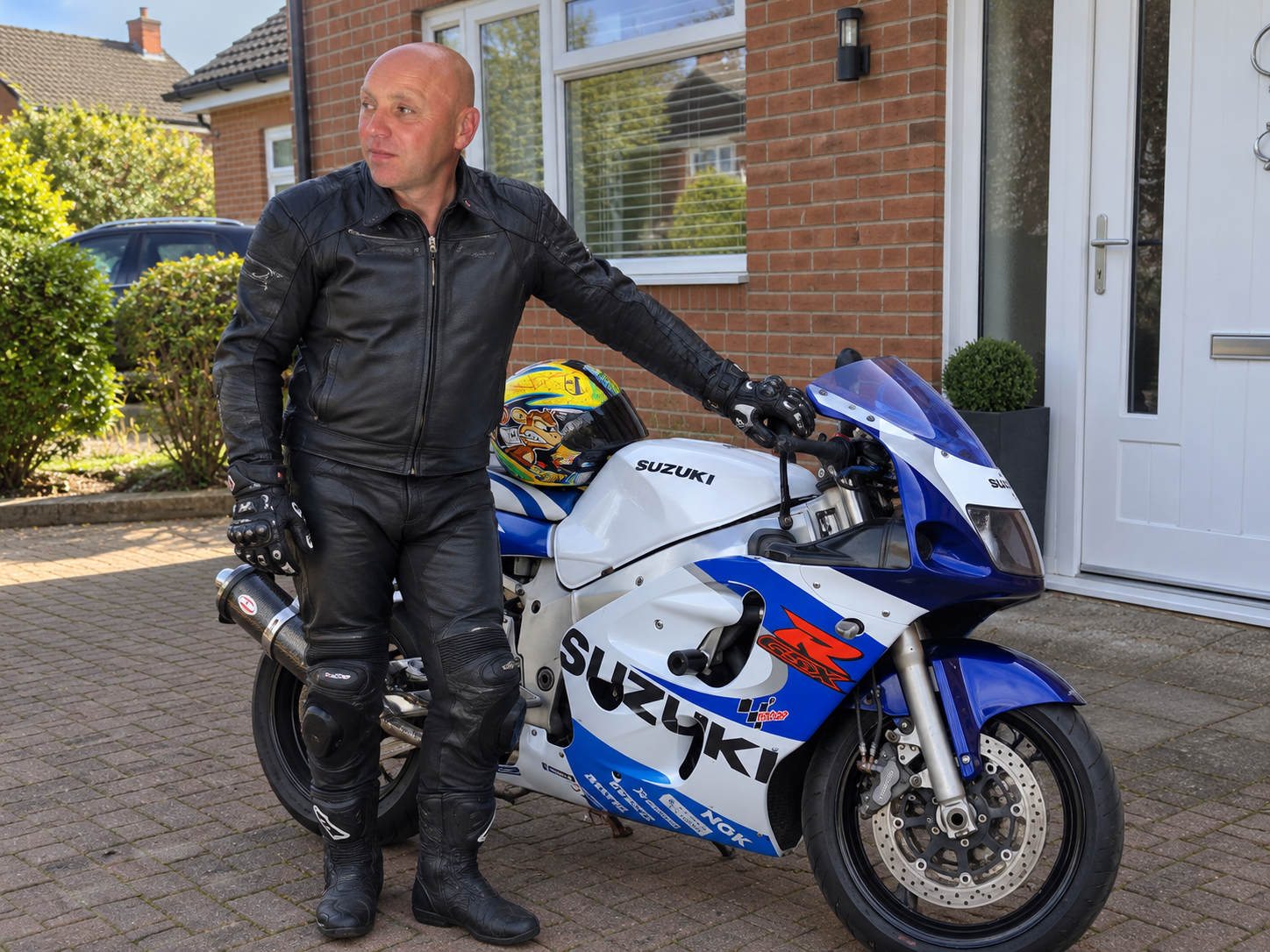 Robert rides a motorbike